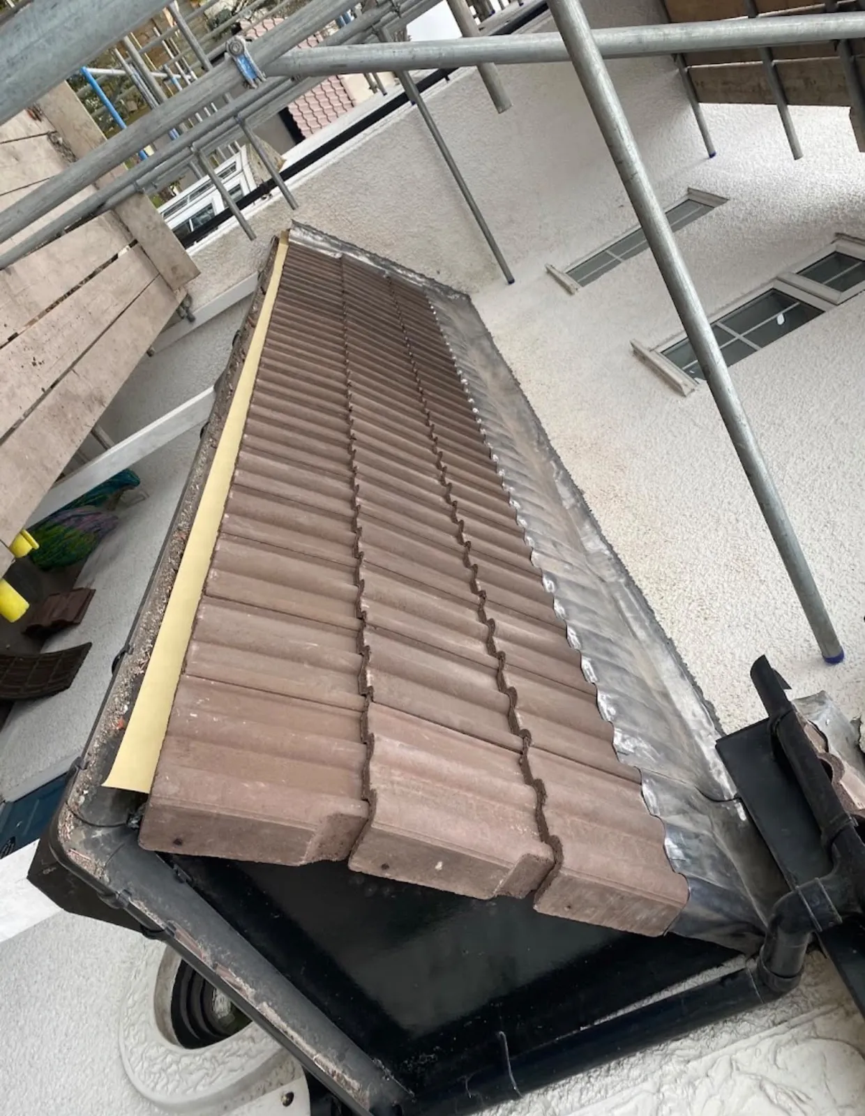 Bay roof re-tiled with new lead flashing