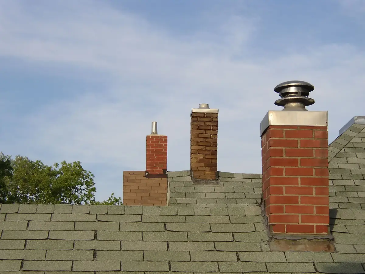Brick chimney stacks on a slate roof