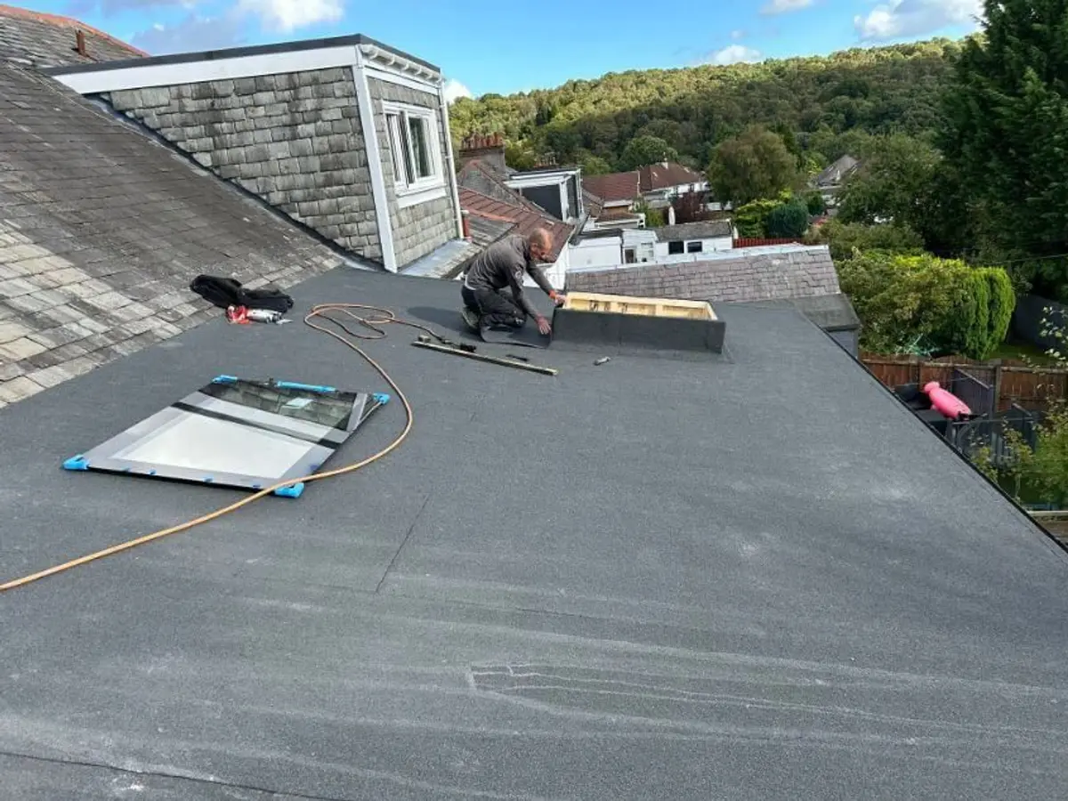 New felt flat roof with roof lights being finished