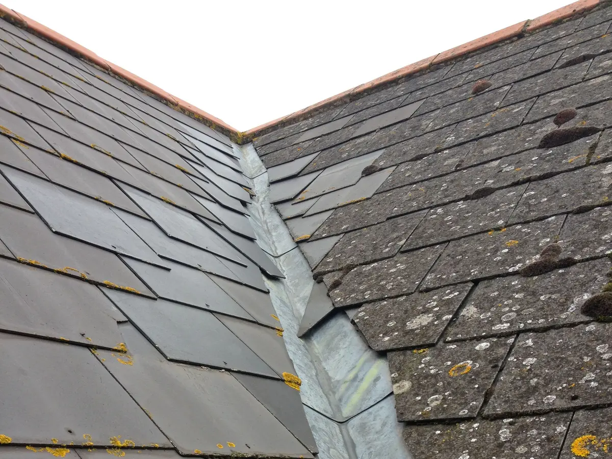Lined valley between two slate roof slopes