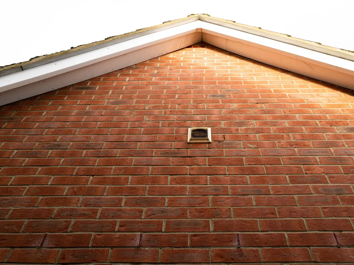 Brick gable with white uPVC bargeboards