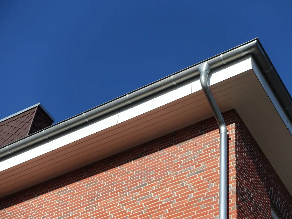 White uPVC fascia, soffit and guttering on a brick house